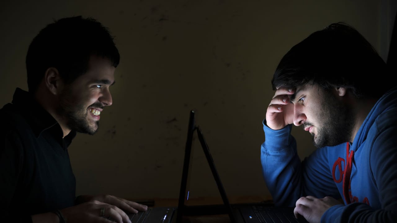 Abstract representation of digital conflict and data leakage