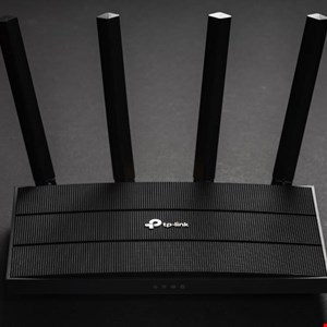 Digital illustration of a router with Russian bear claw marks redirecting data streams to spy servers