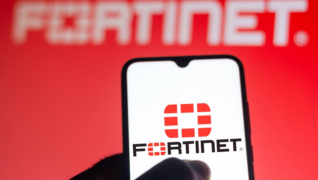 Fortinet FortiClient software interface with red vulnerability warning overlay