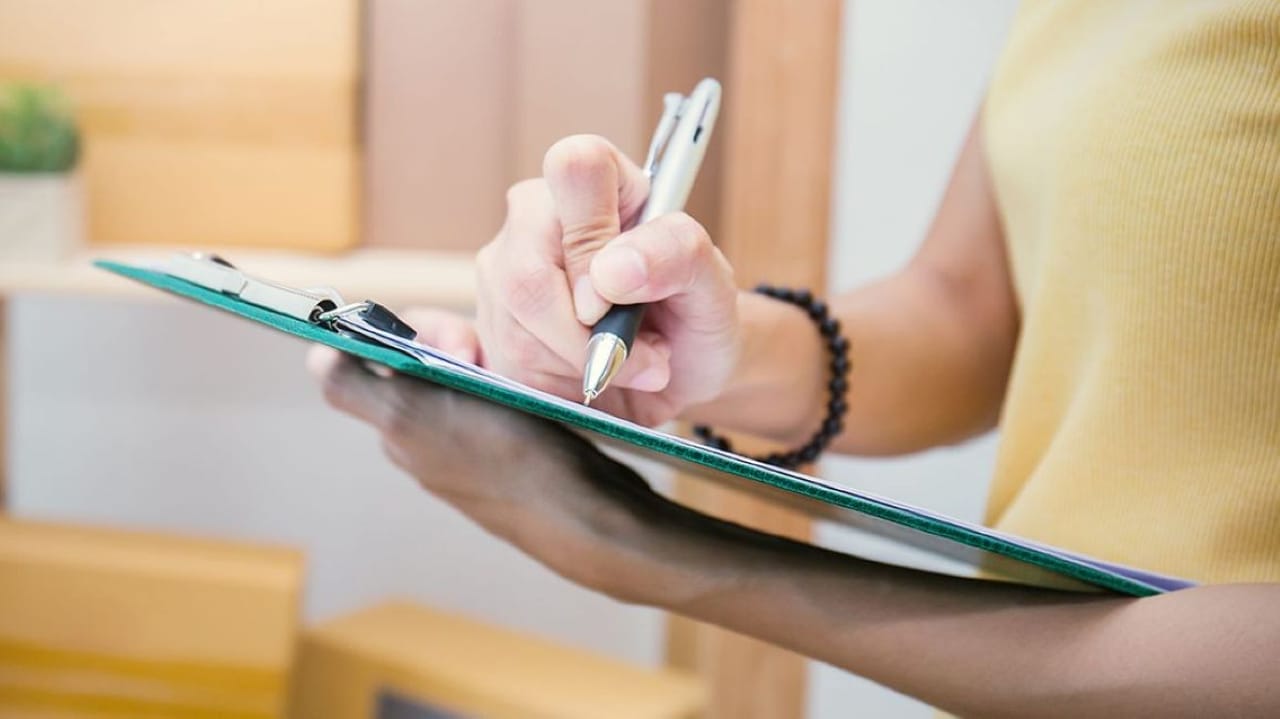 Panel of C-suite executives debating cybersecurity metrics on stage with glowing dashboards behind