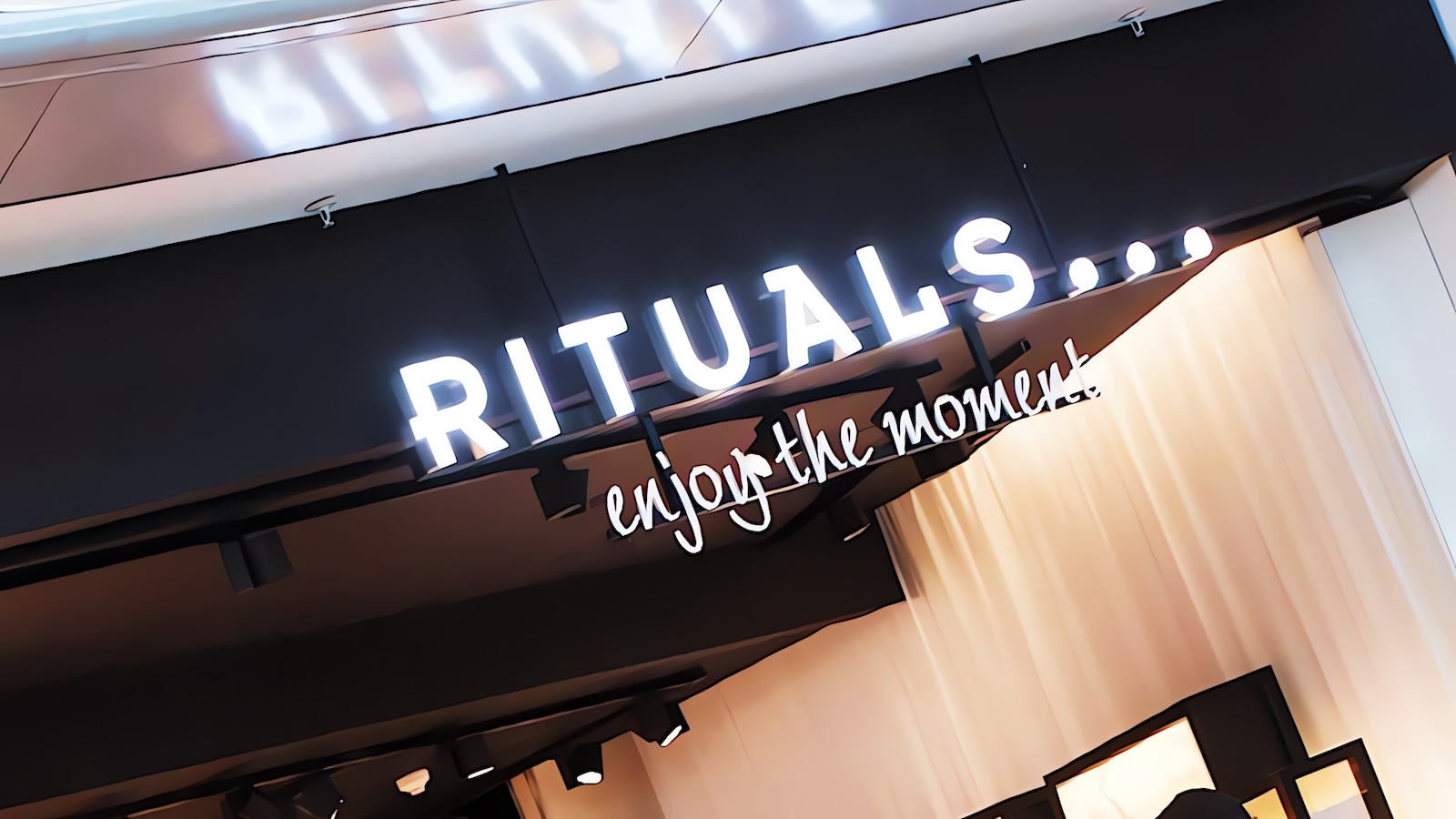 Rituals cosmetics store with digital lock icon overlay symbolizing data breach