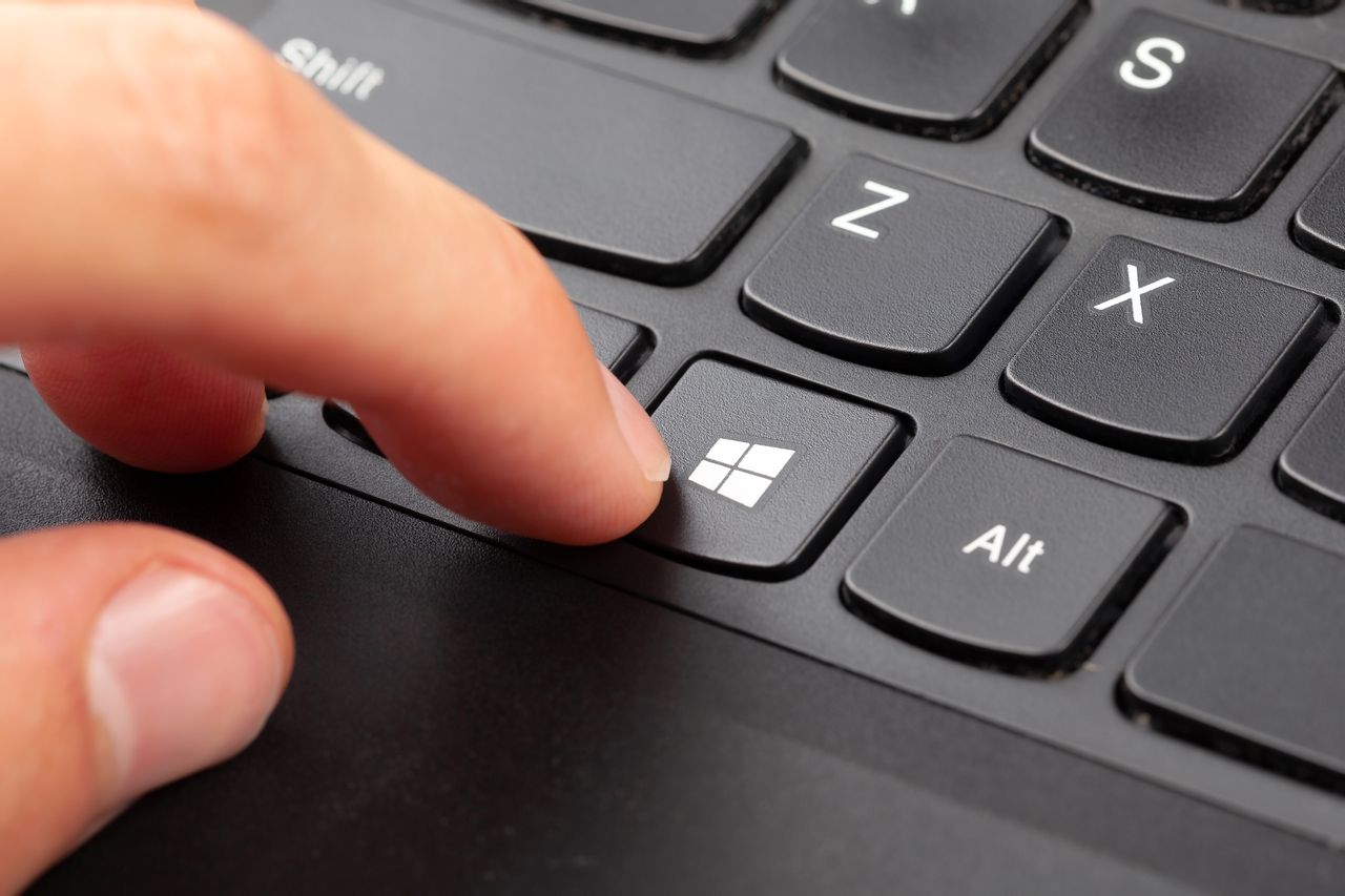 Microsoft Patch Tuesday graphic showing 165 vulnerabilities with privilege escalation dominance