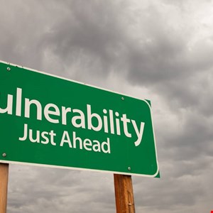Cybersecurity researchers working at computers during Pwn2Own Berlin event
