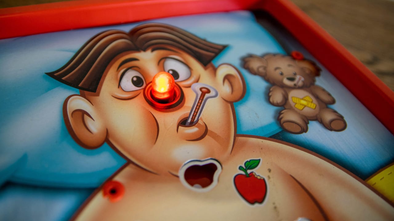 Hasbro headquarters with digital breach warning overlay and locked systems icon