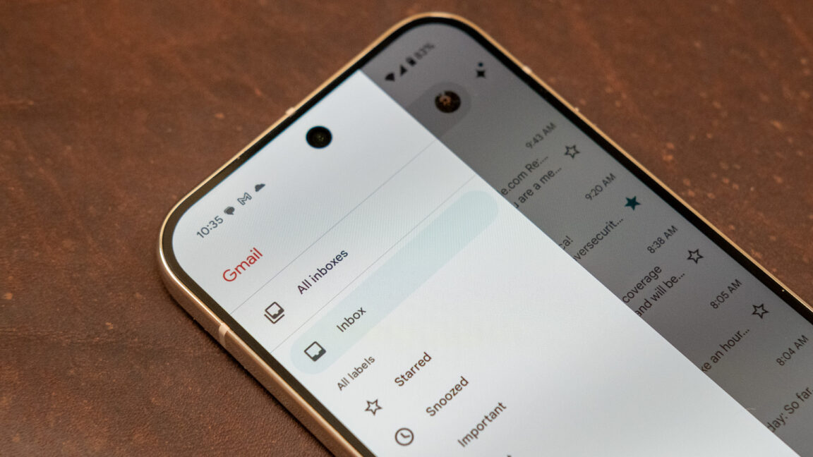 Google Gmail interface with security shield and warning icons amid phishing email backdrop