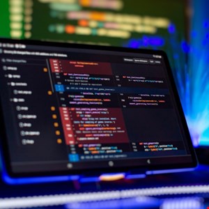 Hacker injecting malware into Axios npm package code with North Korean flag overlay